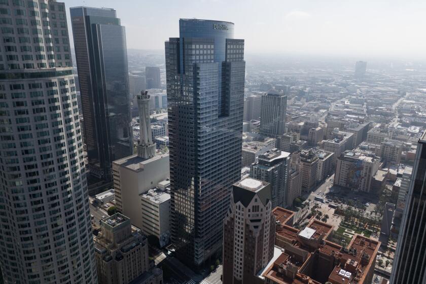 LOS ANGELES, CA- MARCH 28: The Gas Company Tower in downtown, Los Angeles, CA, is facing foreclosure a year after the owner, an affiliate of Brookfield Asset Management Ltd., walked away from the building. A notice of trustee's sale for the building was filed March 21 with the Los Angeles County Recorder's office, setting the stage for a foreclosure sale as soon as 90 days after the filing. Photographed on Thursday, March 28, 2024. (Myung J. Chun / Los Angeles Times)