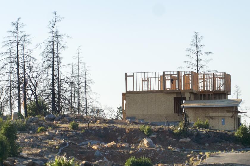 In this Tuesday, Nov. 5, 2019, photo, a new home construction project sits on a hilltop in Santa Rosa, Calif. Many homes in the city were destroyed during the Tubbs Fire of 2017, and many of those homes are still being replaced and rebuilt. This Fountaingrove section of Santa Rosa in California's wine country was one of the neighborhoods turned to piles of ash and debris by the now infamous Tubbs Fire of 2017. It had been the most destructive wildfire in California history, until last year, when the Camp Fire ravaged the town of Paradise, to the north, killing 86 people. (AP Photo/Lacy Atkins)