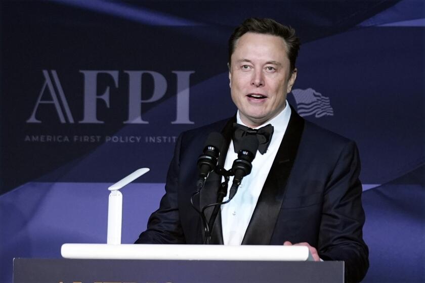 Elon Musk speaks after President-elect Donald Trump spoke during an America First Policy Institute gala at his Mar-a-Lago estate, Thursday, Nov. 14, 2024, in Palm Beach, Fla. (AP Photo/Alex Brandon)