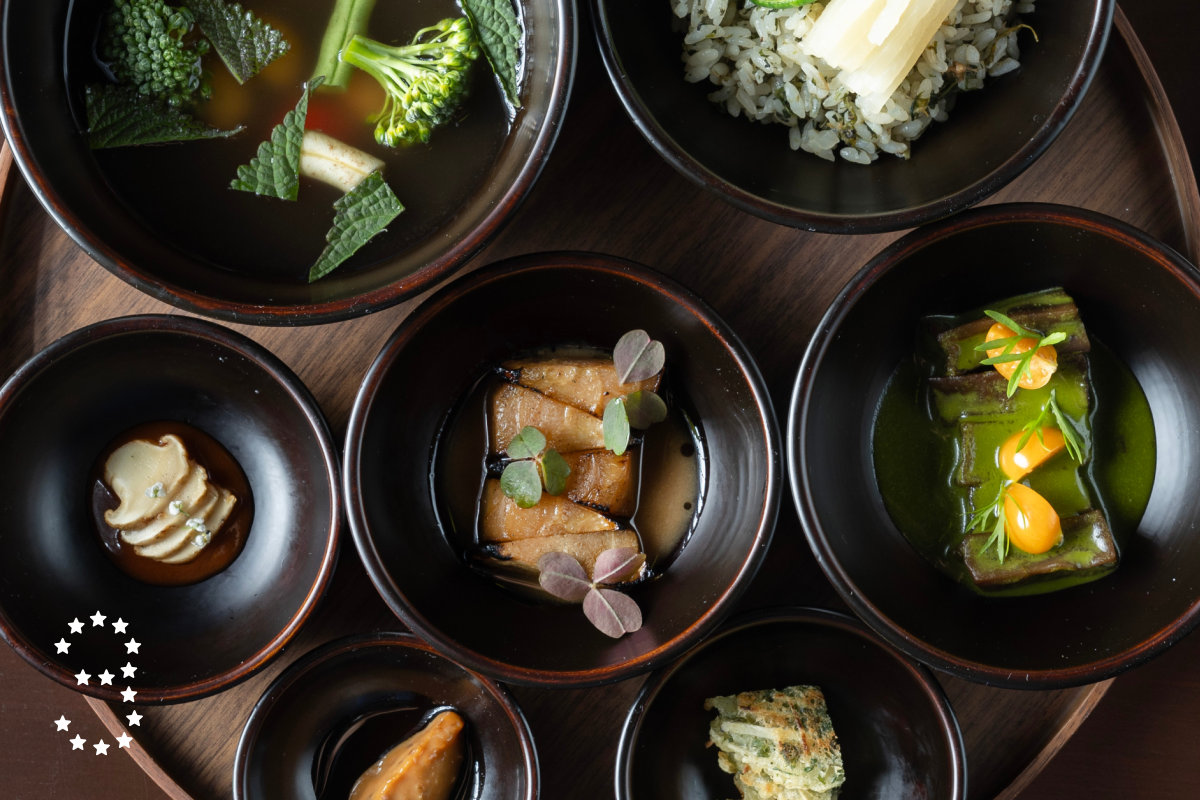 LOS ANGELES, CA - OCTOBER 22: Left: Bansang: soup, shepherd's purse rice, dried acorn jelly, anise hyssop, dooboo jang, pyogo mushroom and artichoke and doenjang omija. Deep fried sole with parae seaweed gim gochunaengi, gooseberry, ssam and at Baroo in Los Angeles, CA on Tuesday, Oct. 22, 2024. (Myung J. Chun / Los Angeles Times)