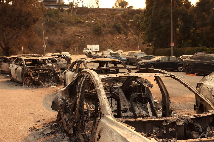 PACIFIC PALISADES, CA, JANUARY 11, 2025: Vehicles abandoned along Sunset Boulevard as residents tried to evacuate in Pacific Palisades earlier this week, on Saturday, January 11, 2025. (Christina House / Los Angeles Times)