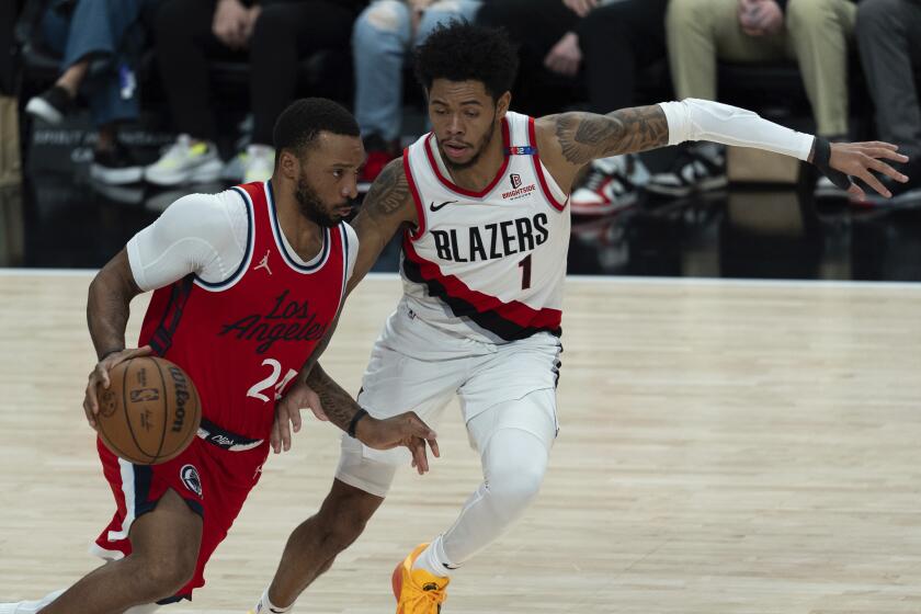 Los Angeles Clippers guard Norman Powell (24) tries to get around the defense.