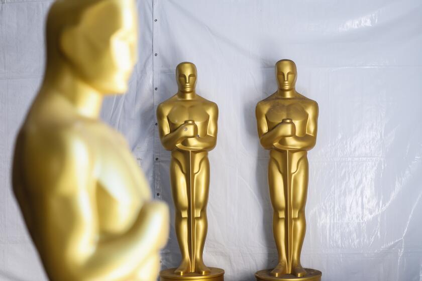 Los Angeles, CA, Thursday, March 9, 2023 - Oscar statues wait for touch-ups as work continues on Hollywood Blvd. in preparation for the 95th Academy Awards. (Robert Gauthier/Los Angeles Times)