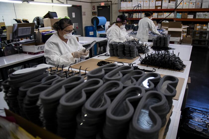 TEMECULA, CA - FEBRUARY 7, 2020: Workers at Paulson's assemble medical goggles for shipment to China to help prevent the spread of the coronavirus on February 7, 2020 in Temecula, California. (Gina Ferazzi/Los AngelesTimes)