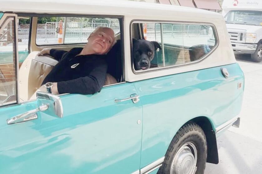 Governor Walz and Scout ride in a Scout International. Courtesy of Governor Tim Walz