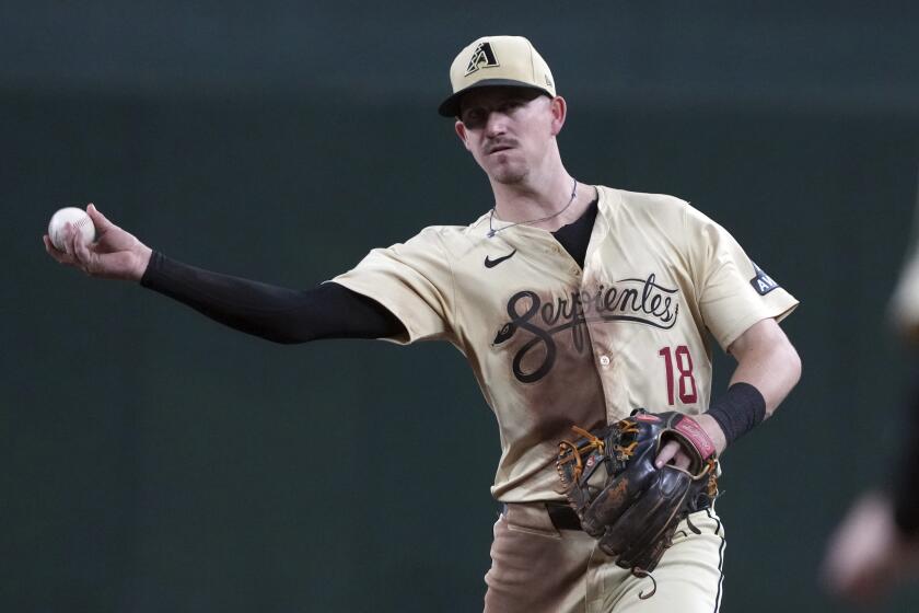 FILE - Arizona Diamondbacks shortstop Kevin Newman (18) against the Washington Nationals.