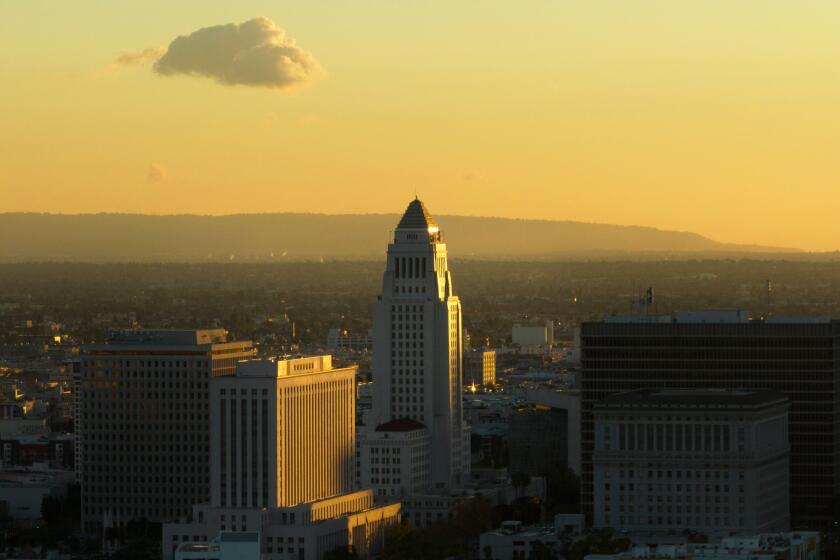 LOS ANGELES, CA - DECEMBER 12: (FILE ART FOR CITY HALL / CITY COUNCIL STORIES). Sunset at City Hall in downtown Los Angeles on Monday, Dec. 12, 2022. (Myung J. Chun / Los Angeles Times)