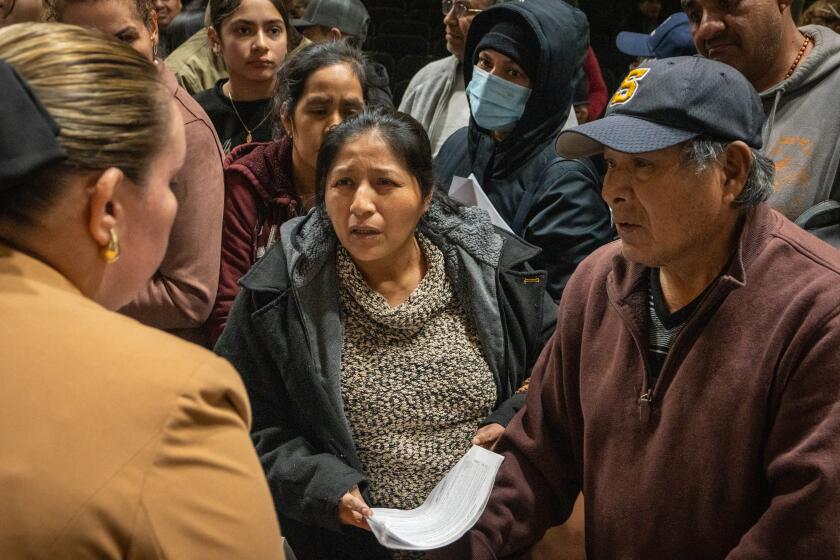 DELANO, CALIF. JANUARY 9, 2025 - Immigrants get information about their constitutional rights after a presentation by a consortium of attorneys, organizations, and community experts at the Robert F. Kennedy High School Auditorium in Delano. (Tomas Ovalle / For The Times)