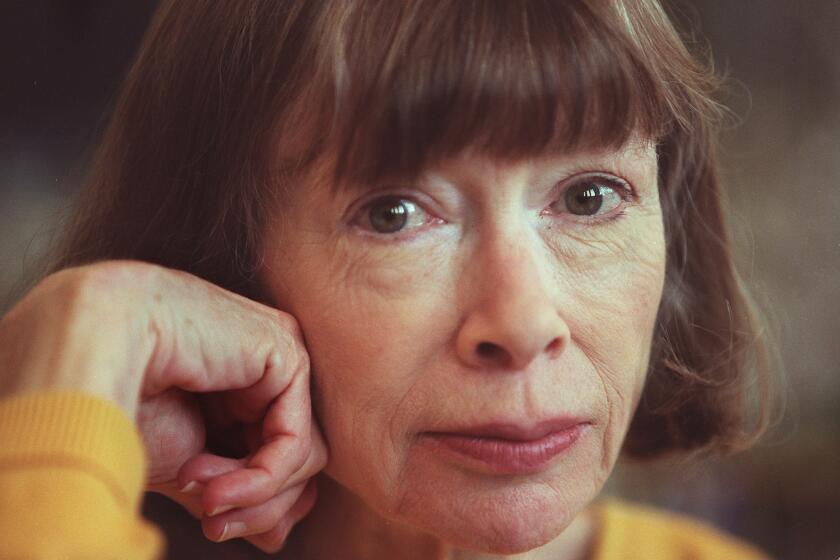 BEREKELEY, California,9–20–96––Writer Joan Didion waits in Doe Library at UC Berkeley to read rememberances of her life as undergraduate Cal at a fundraising rehearsal. The fundraising dinner was to be held later that night. For an author profile on Didion who just published her first book, "The Last Thing He Wanted" , in 12 years. Mandatory Credit: Robert Durell/The LA Times