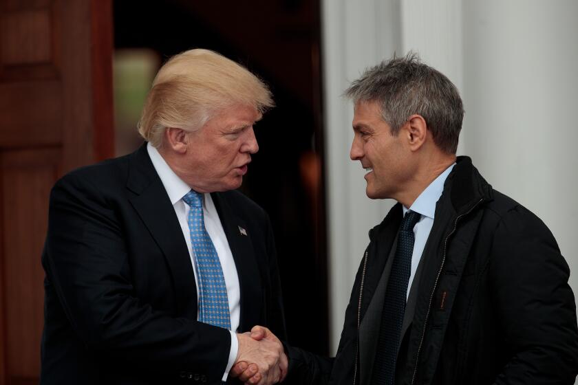 BEDMINSTER TOWNSHIP, NJ - NOVEMBER 20: (L to R) President-elect Donald Trump shakes hands with Ari Emanuel, co-CEO of William Morris Endeavor, following their meeting at Trump International Golf Club, November 20, 2016 in Bedminster Township, New Jersey. Trump and his transition team are in the process of filling cabinet and other high level positions for the new administration. (Photo by Drew Angerer/Getty Images)