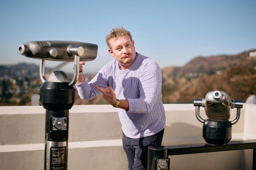 Los Angeles, CA - December 10: Portrait of James Adomian, a beloved LA comic before his Irvine show Jan 19 on the heels of his latest special "Path of Most Resistance." Griffith Observatory on Tuesday, Dec. 10, 2024 in Los Angeles, CA. (Marcus Ubungen / Los Angeles Times)