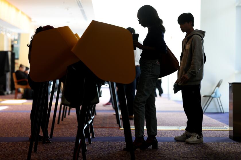 LOS ANGELES-CA-NOVEMBER 5, 2024: Voters cast their ballots at The Music Center in downtown Los Angeles on November 5, 2024. (Christina House / Los Angeles Times)