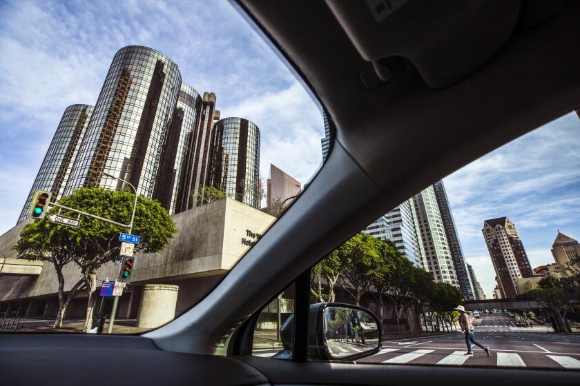 The Westin Bonaventure Hotel & Suites is a cluster of shimmering bronze-windowed towers evoking a rocket ship set to launch. 