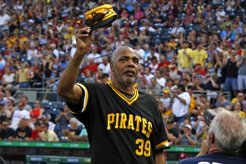 FILE - Member of the 1979 Pittsburgh Pirates World Championship team Dave Parker tips his cap during a pre-game ceremony honoring the team before a baseball game between the Pittsburgh Pirates and the Philadelphia Phillies in Pittsburgh, Saturday, July 20, 2019. (AP Photo/Gene J. Puskar, File)