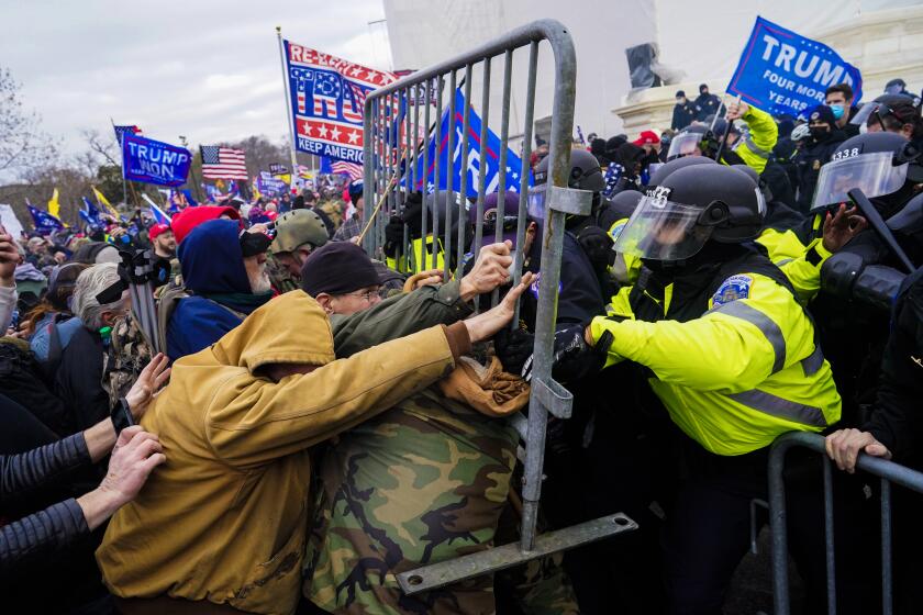 Pro-Trump protesters clash with police.