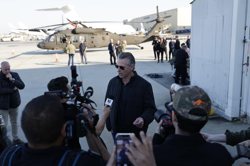 Los Angeles, CA - January 11: California Gov. Gavin Newsom speaks with reporters at LAX on Saturday, Jan. 11, 2025 in Los Angeles, CA. (Carlin Stiehl / For the Times)