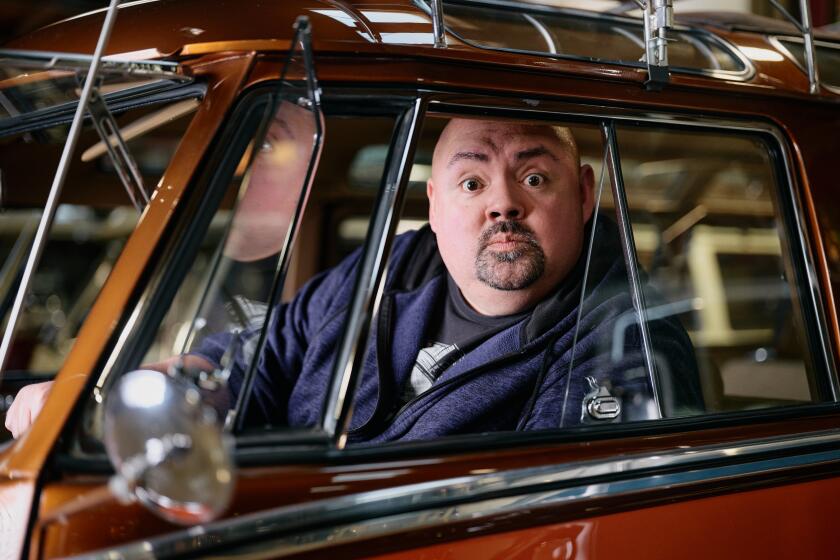 Long Beach, CA - December 03: Portrait of Gabriel Iglesias inside his garage compound. on Tuesday, Dec. 3, 2024 in Long Beach, CA. (Marcus Ubungen / Los Angeles Times)