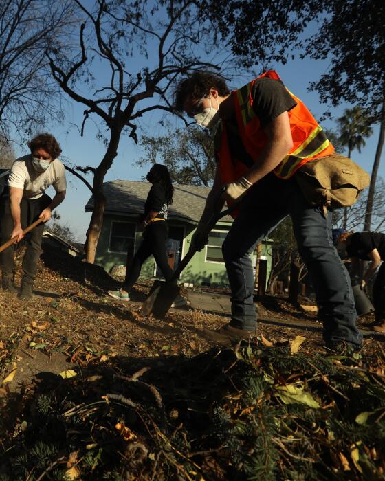 Garett Collins, 22, right, and Jack Tamburro, 30, members of the Day Labor Fire Brigade