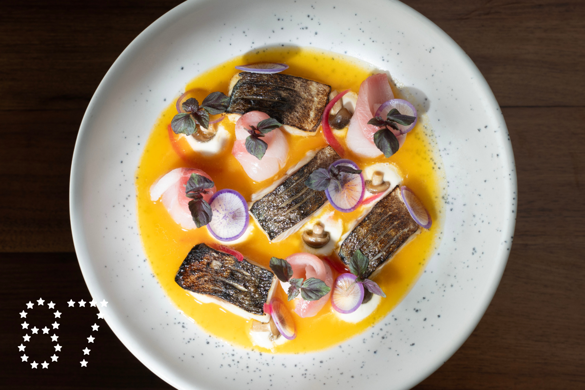 Mackerel and yellowtail sashimi in tomato water