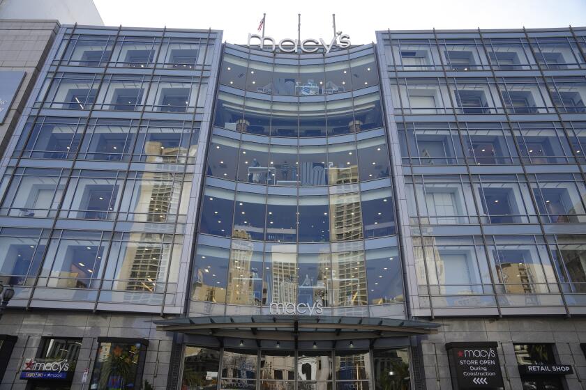 The Macy's store overlooking Union Square is seen in San Francisco, Tuesday, Feb. 27, 2024. Macy's will close 150 unproductive namesake stores over the next three years including 50 by year-end, the department store operator said Tuesday after posting a fourth-quarter loss and declining sales. The Union Square store is among dozens it's considering closing. (AP Photo/Eric Risberg)